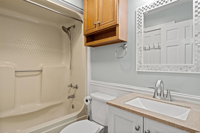 full bathroom with shower / washtub combination, toilet, and vanity