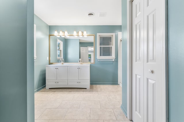 bathroom with vanity and tile patterned flooring