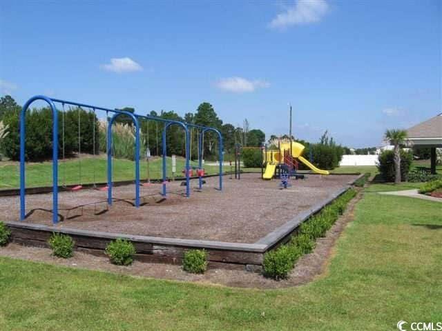 view of play area with a yard