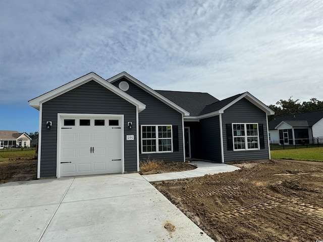 ranch-style home with a garage