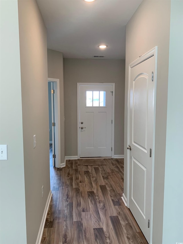 doorway to outside featuring dark hardwood / wood-style floors