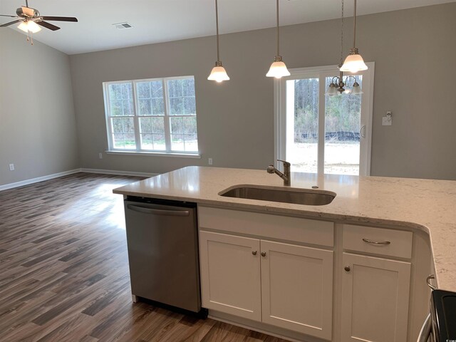 kitchen featuring dishwasher, dark hardwood / wood-style floors, sink, light stone countertops, and white cabinets