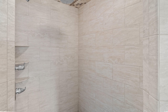 room details featuring a tile shower