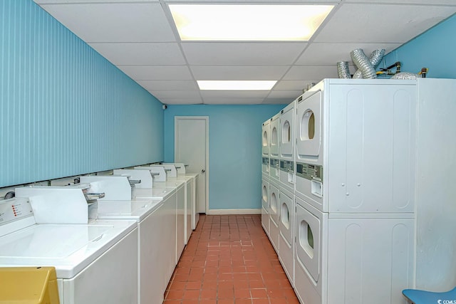 clothes washing area featuring independent washer and dryer and stacked washing maching and dryer