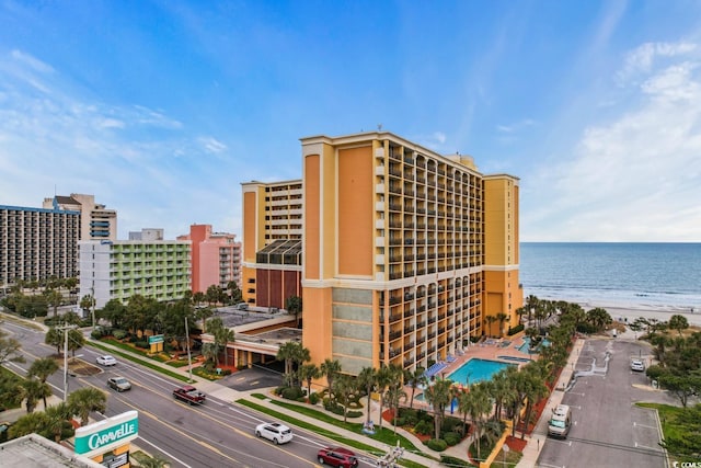 property's view of city with a beach view and a water view