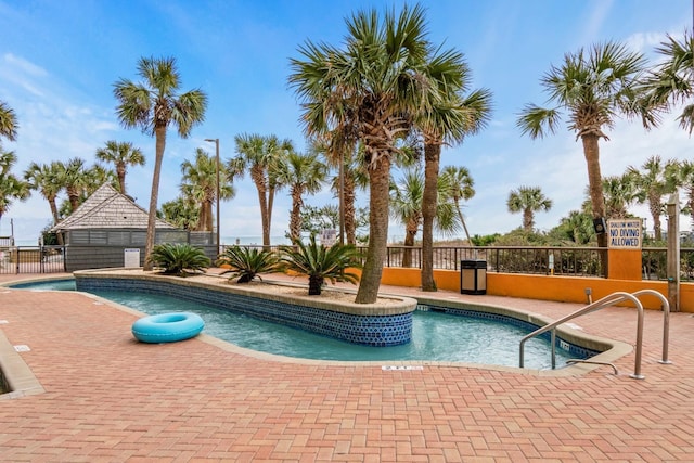 view of pool featuring a patio area