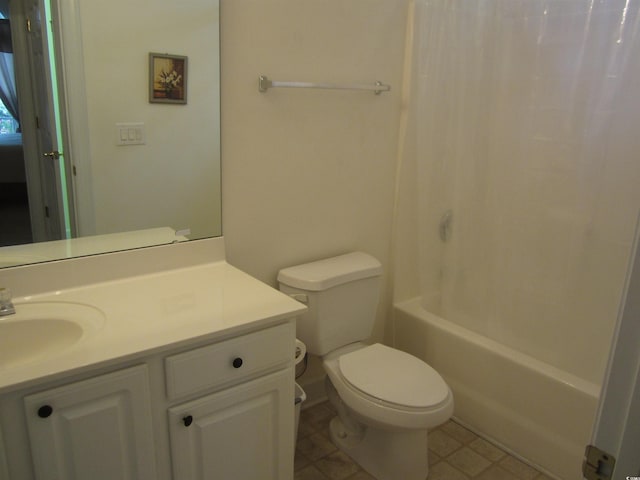 full bathroom with toilet, vanity, and shower / tub combo with curtain