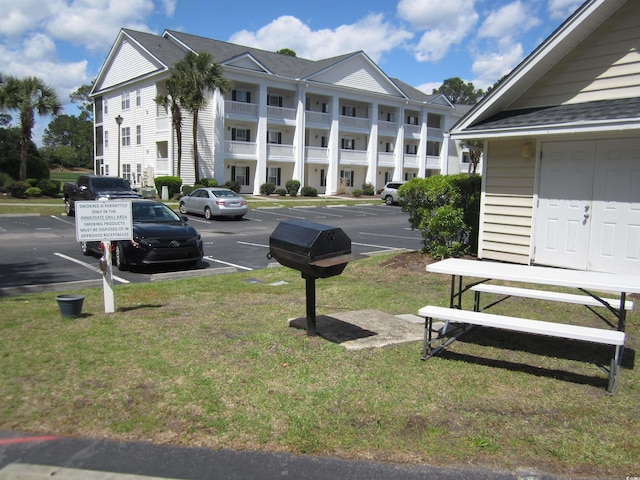 exterior space featuring uncovered parking