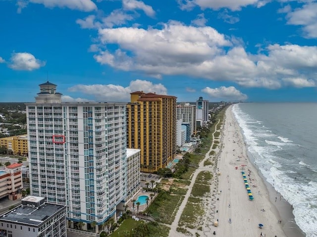 property's view of city featuring a view of the beach and a water view