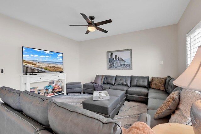 living room featuring ceiling fan