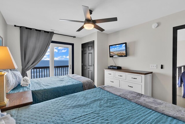 bedroom featuring ceiling fan and access to outside