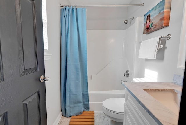 bathroom featuring vanity, toilet, and shower / bath combo with shower curtain