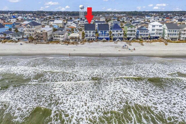 bird's eye view with a view of the beach and a water view