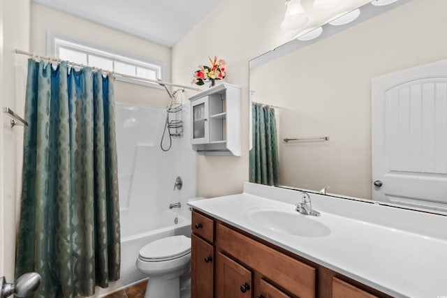 full bathroom with shower / bath combination with curtain, toilet, and vanity