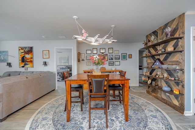 dining area with light wood-type flooring