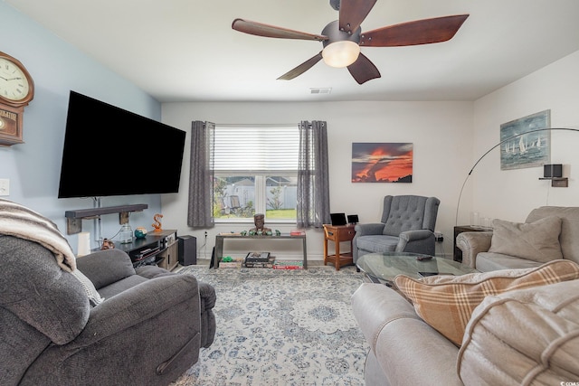 living room featuring ceiling fan