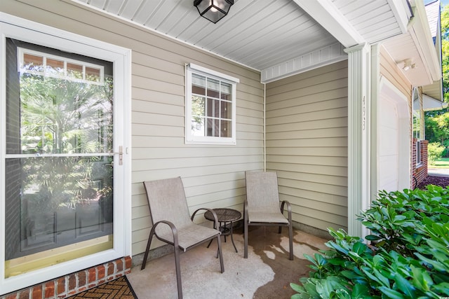 view of patio / terrace featuring a garage