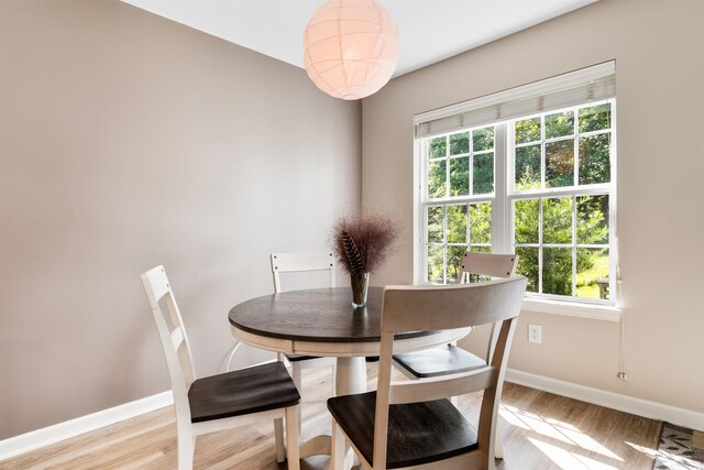 dining space featuring light hardwood / wood-style flooring