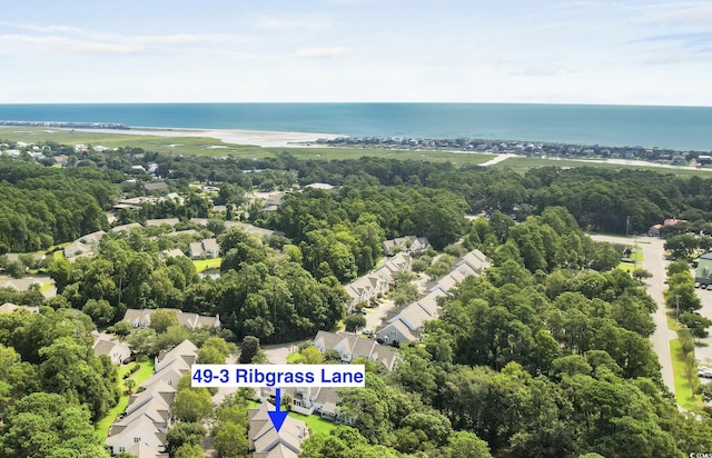 aerial view featuring a residential view and a water view