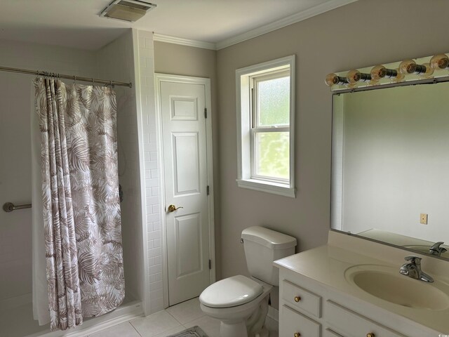 bathroom featuring tile patterned floors, toilet, vanity, and curtained shower