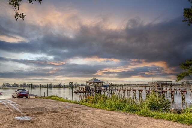 view of dock with a water view