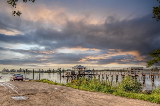 dock area featuring a water view