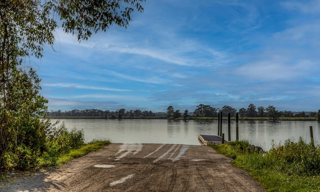 exterior space with a water view