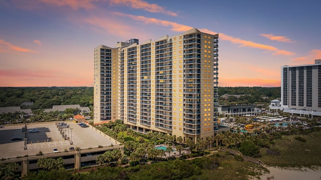 view of outdoor building at dusk