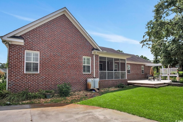 exterior space with a lawn and a patio area