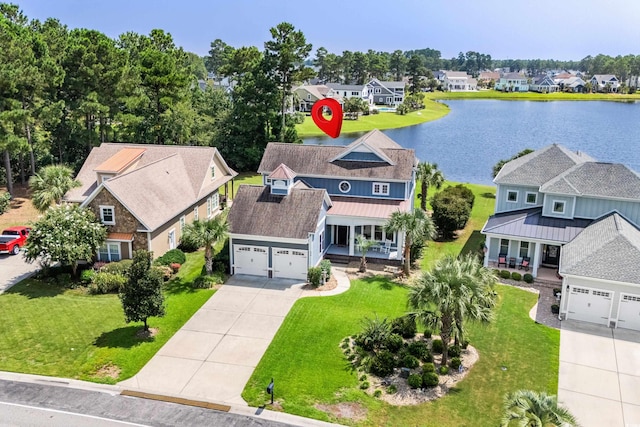 bird's eye view with a water view