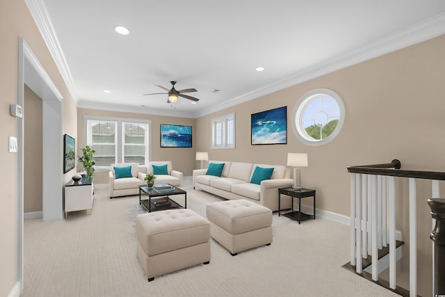 living room with ornamental molding, ceiling fan, and light colored carpet