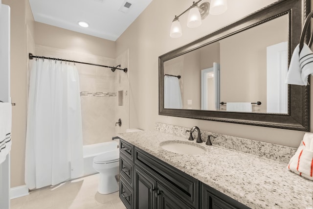 full bathroom featuring toilet, vanity, tile patterned floors, and shower / tub combo with curtain