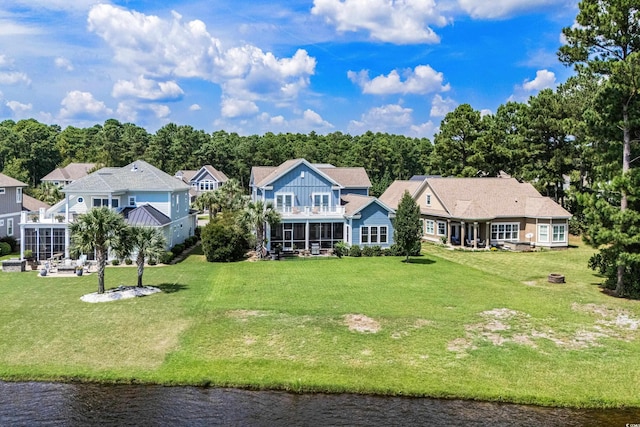 drone / aerial view with a water view