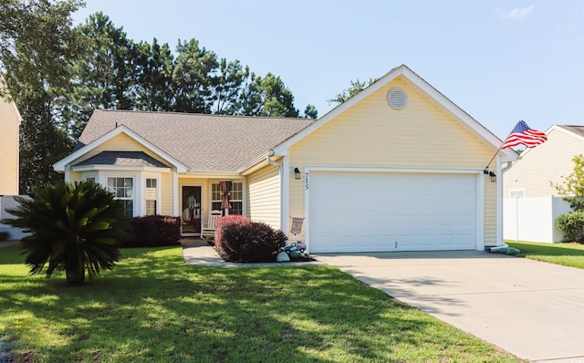 ranch-style house with a front yard and a garage