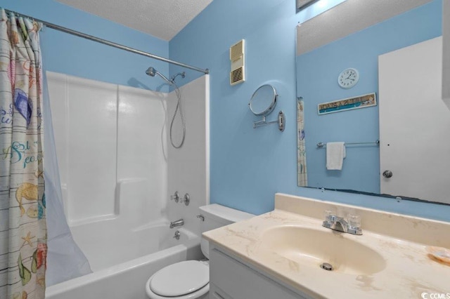 4305 S Ocean Blvd Unit 106, North Myrtle Beach, SC 29582 - bathroom featuring shower / bath combo with shower curtain, vanity, and a textured ceiling