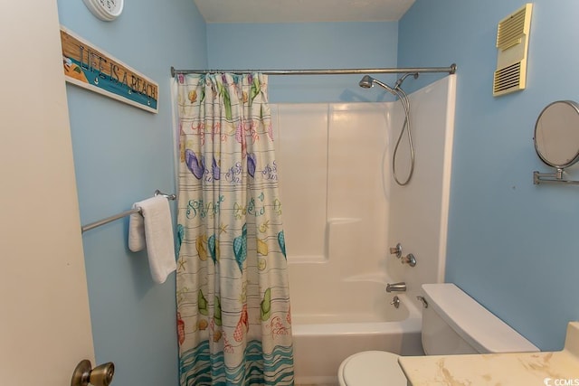 full bathroom with shower / tub combo and toilet