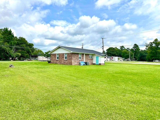 view of front of home with a front yard