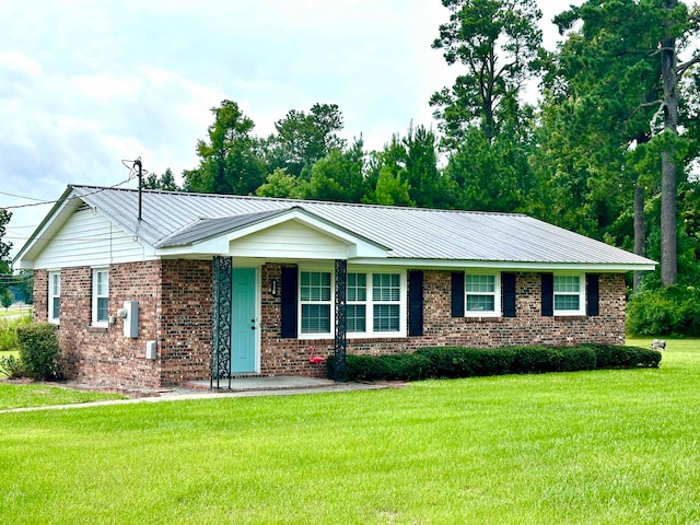 ranch-style home featuring a front yard