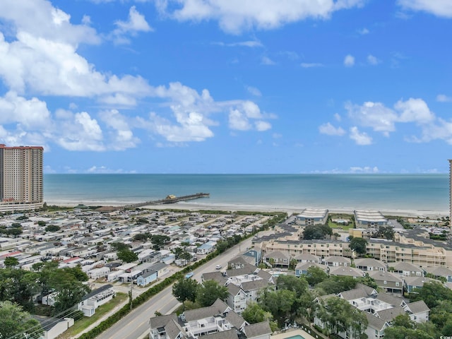 drone / aerial view with a view of the beach and a water view