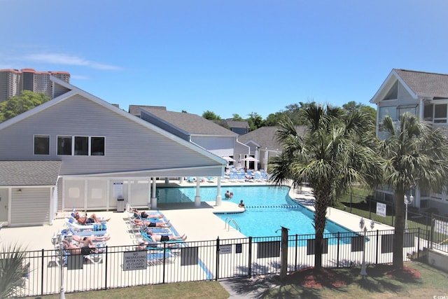 view of swimming pool featuring a patio area