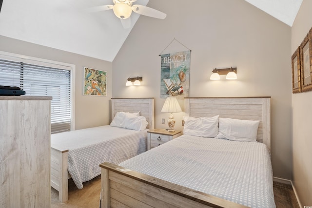 bedroom with ceiling fan, light colored carpet, and high vaulted ceiling