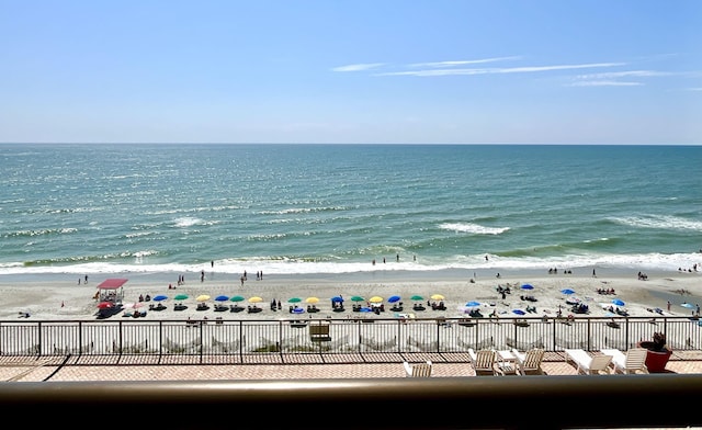 property view of water featuring a beach view