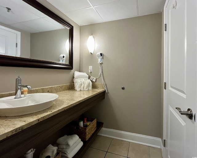 bathroom with tile patterned floors and vanity