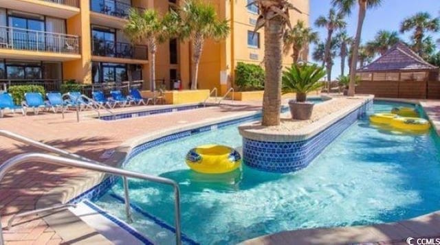 view of swimming pool with a gazebo