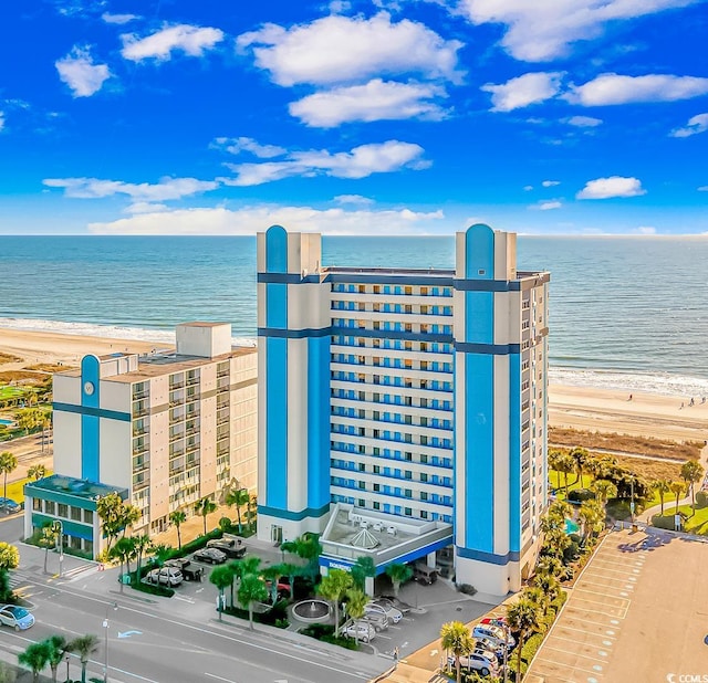 bird's eye view with a beach view and a water view