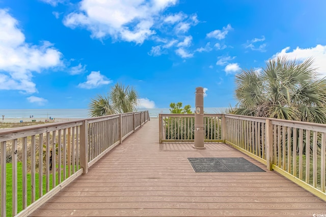 deck featuring a water view