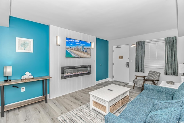 living room with light hardwood / wood-style floors