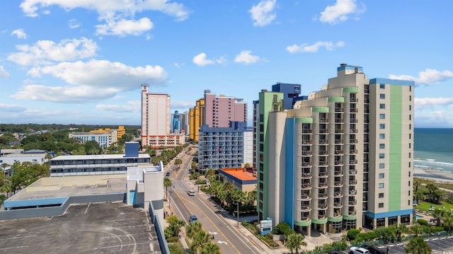 property's view of city featuring a water view