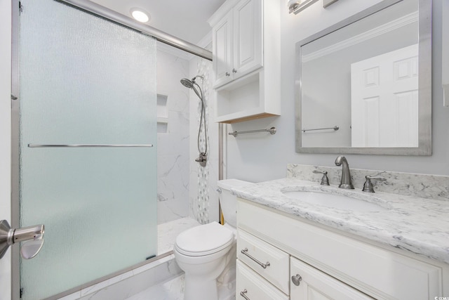 full bathroom with marble finish floor, toilet, vanity, and a marble finish shower