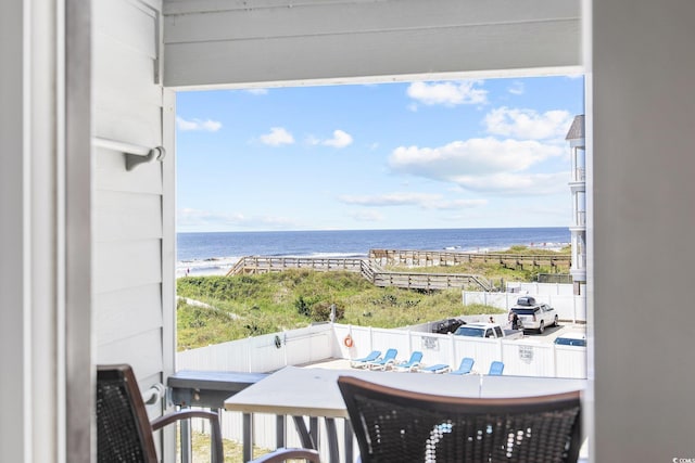 balcony featuring a water view